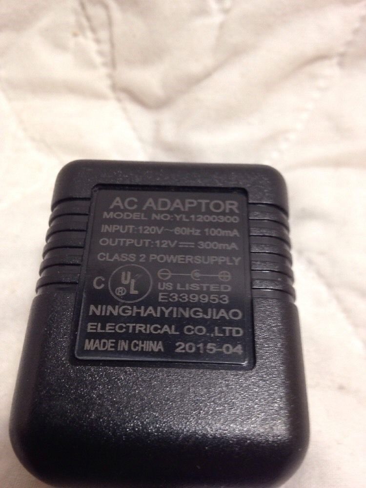 AC Adapter Model YL1200300 12V 300mA